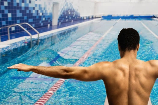 diver with arms stretched