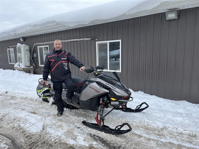 Dr. Joel S. Back on His Snowmobile